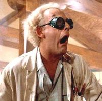 Doc Brown shocked, wearing dark sunglasses